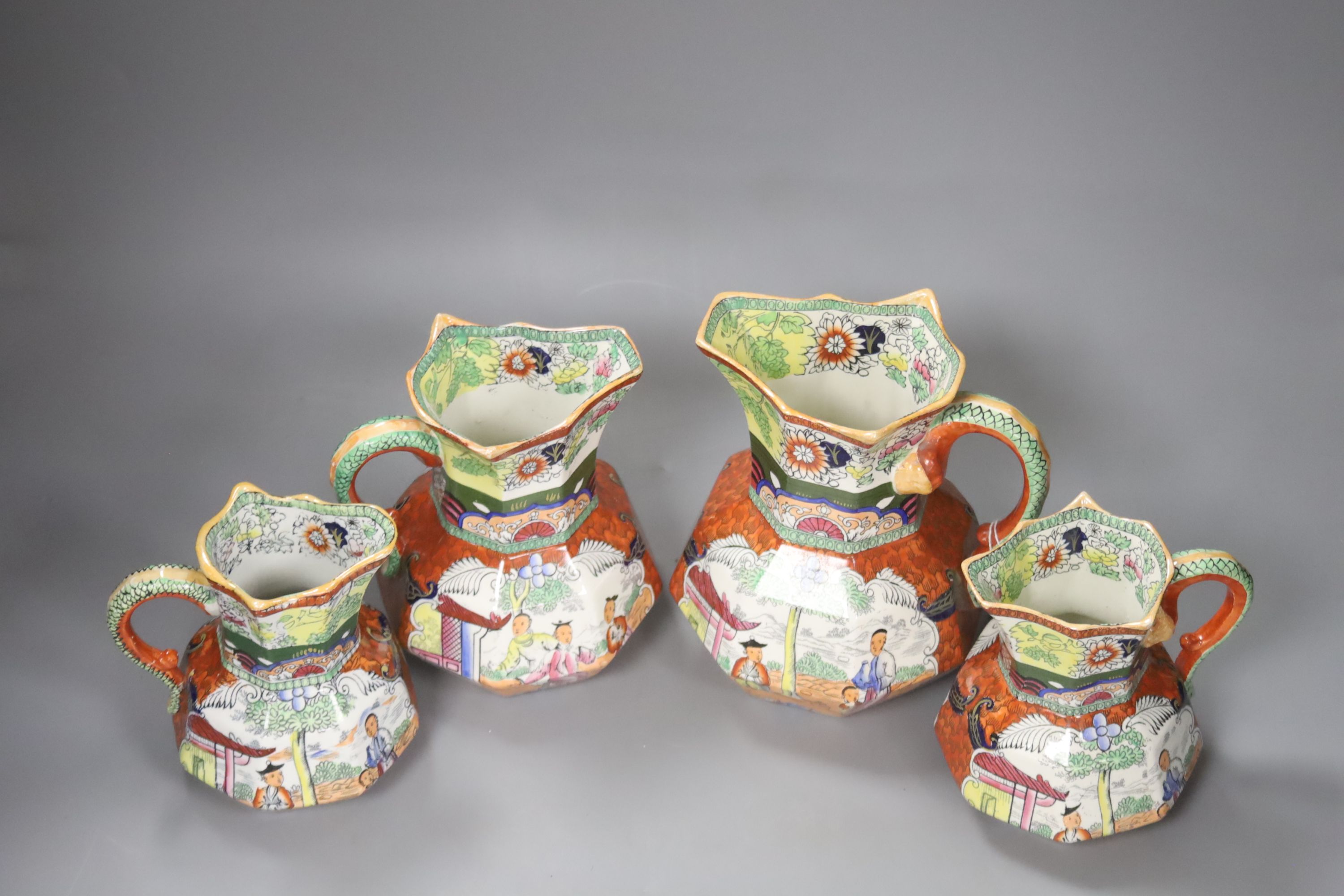 A graduating set of four Masons Ironstone jugs